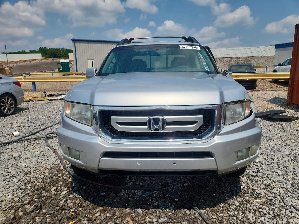Photo 5 from auction – 2011 HONDA RIDGELINE with VIN 5FPYK1F50BB007273