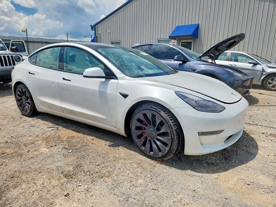 Photo 4 from auction – 2021 TESLA MODEL 3 with VIN 5YJ3E1EC5MF875363