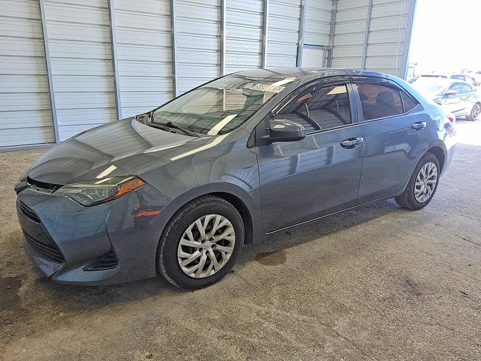 TOYOTA COROLLA 2018 with VIN 5YFBURHE7JP782998 - Photo from auction