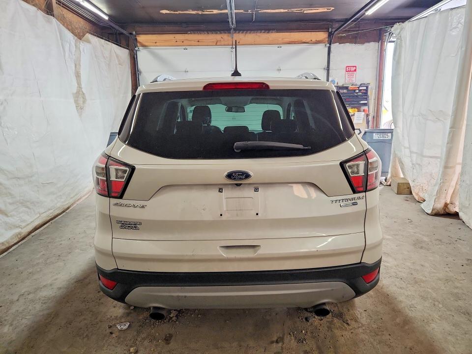 Photo 6 from auction – 2018 FORD ESCAPE with VIN 1FMCU9J92JUB21279
