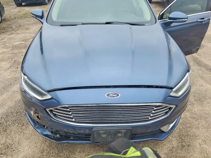 Photo 11 from auction – 2018 FORD FUSION with VIN 3FA6P0T98JR130017