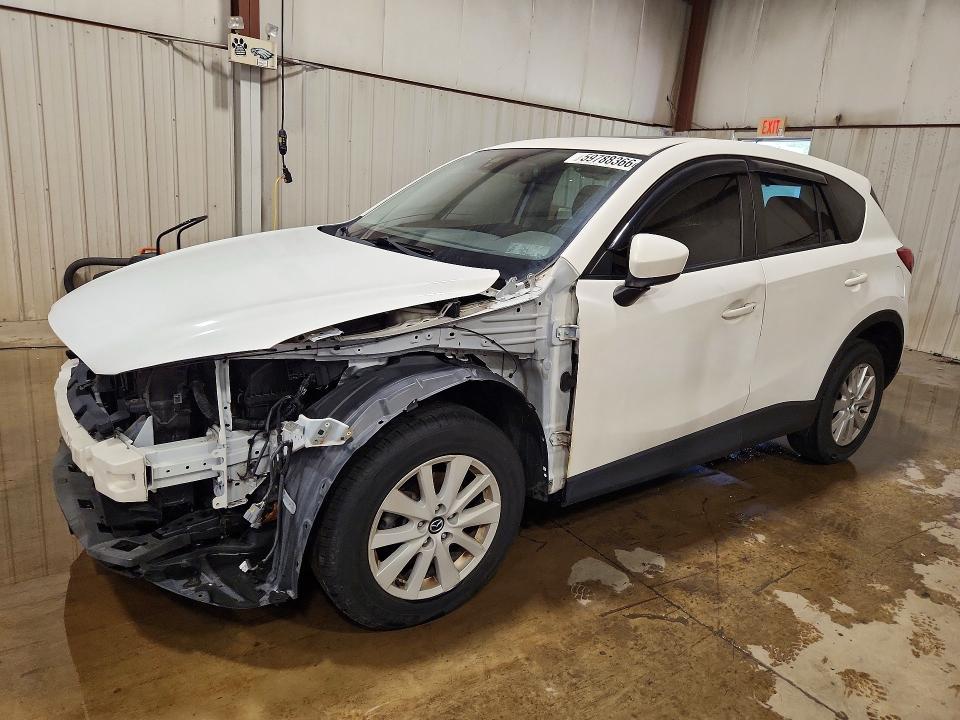 MAZDA CX-5 2014 with VIN JM3KE4CY0E0381818 - Photo from auction