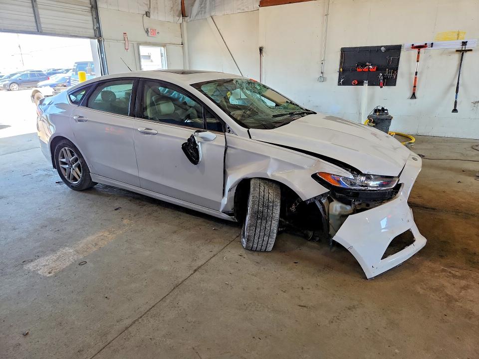 Photo 4 from auction – 2014 FORD FUSION with VIN 3FA6P0H75ER198658