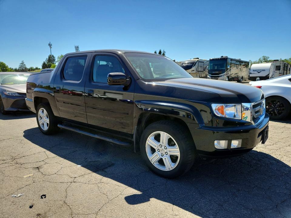 Photo 4 from auction – 2010 HONDA RIDGELINE with VIN 5FPYK1F52AB013543