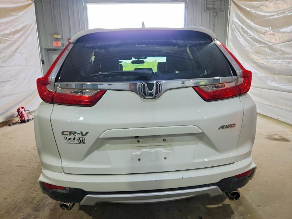 Photo 6 from auction – 2019 HONDA CR-V with VIN 2HKRW2H86KH609384