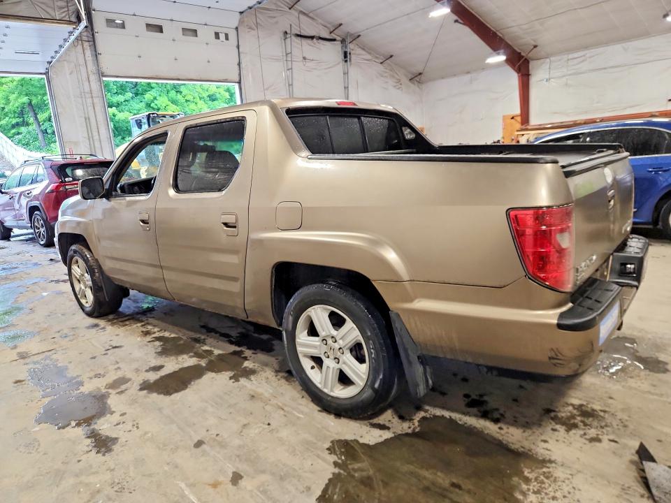 Photo 2 from auction – 2009 HONDA RIDGELINE with VIN 5FPYK16519B104525