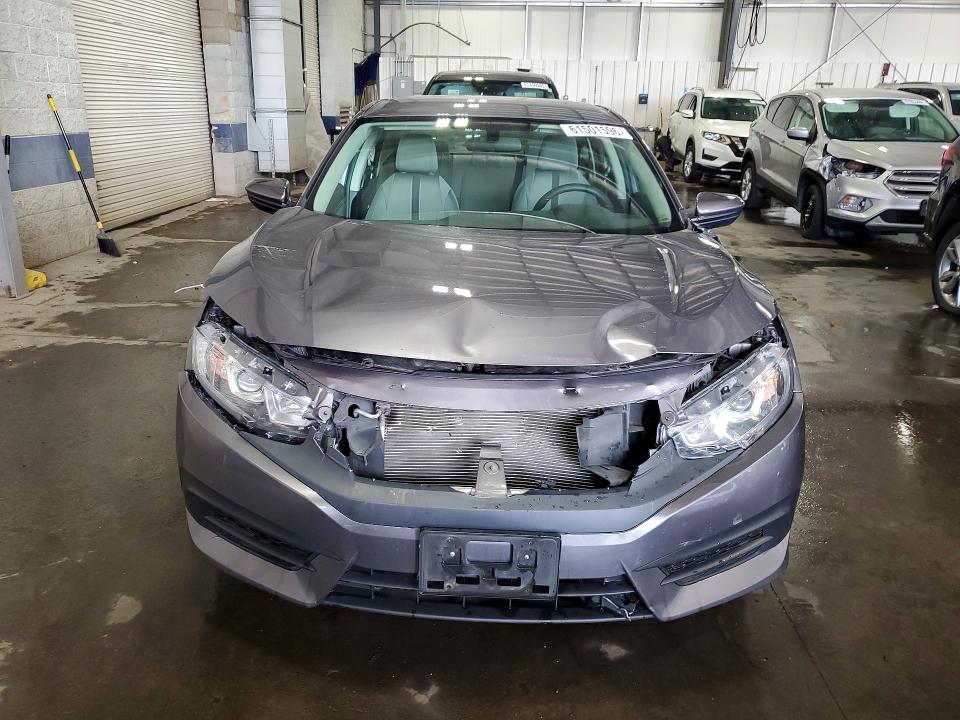 Photo 5 from auction – 2018 HONDA CIVIC with VIN 19XFC2F5XJE038067
