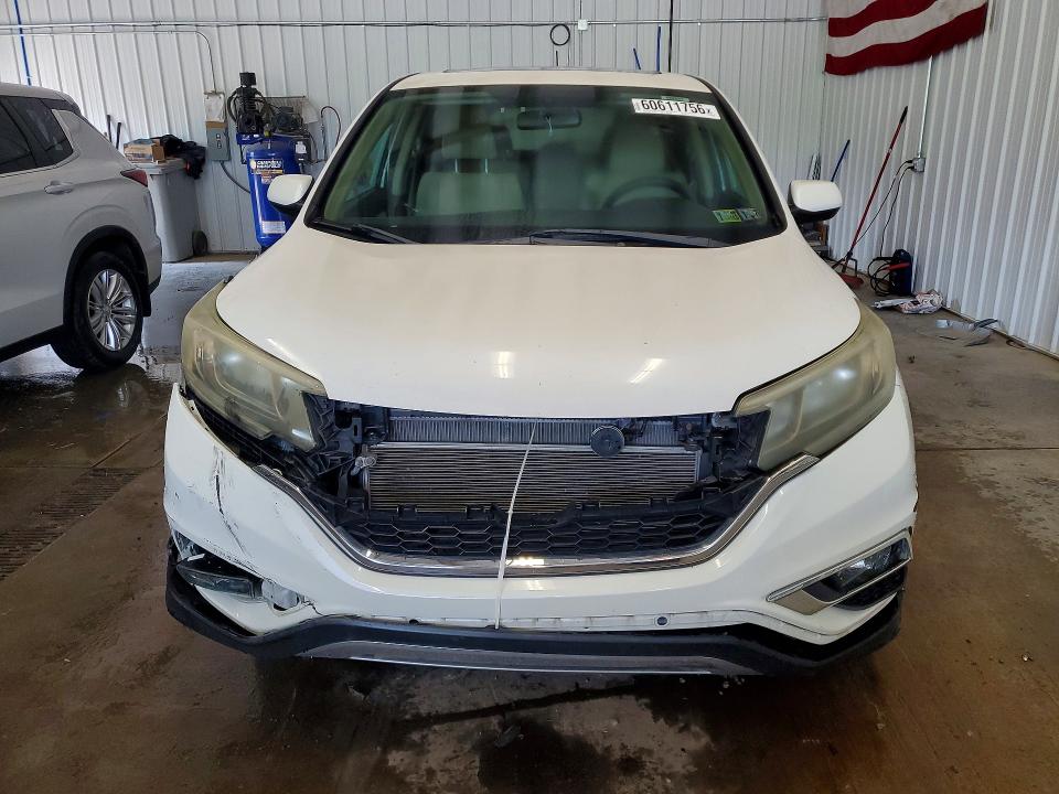 Photo 5 from auction – 2015 HONDA CR-V with VIN 5J6RM4H57FL086878