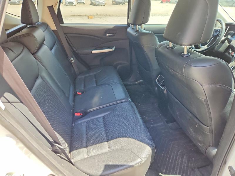 Photo 10 from auction – 2015 HONDA CR-V with VIN 5J6RM4H96FL008076