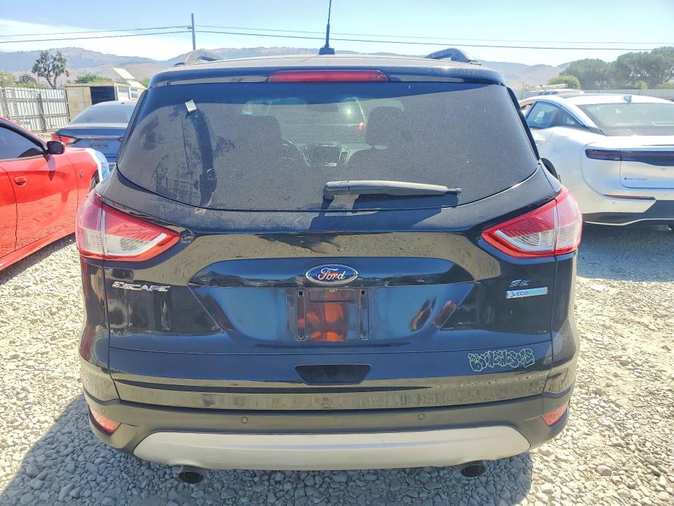 Photo 6 from auction – 2016 FORD ESCAPE with VIN 1FMCU0GX1GUB67017