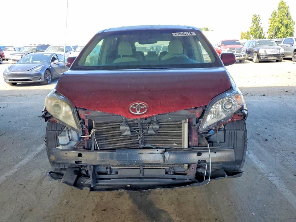Photo 5 from auction – 2014 TOYOTA SIENNA with VIN 5TDKK3DC3ES526684