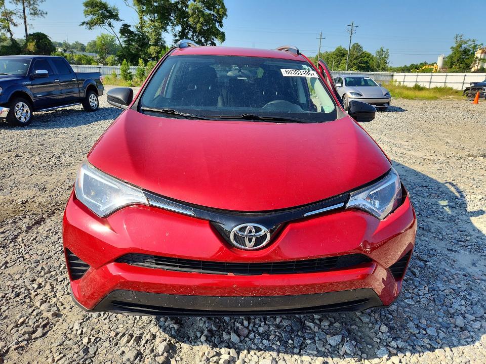 Photo 5 from auction – 2016 TOYOTA RAV4 with VIN JTMZFREV9GJ099288