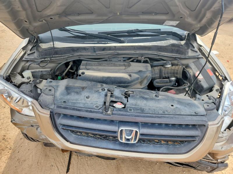 Photo 12 from auction – 2004 HONDA PILOT with VIN 2HKYF18584H580811