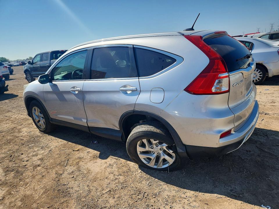 Photo 2 from auction – 2016 HONDA CR-V with VIN 5J6RM4H72GL135214