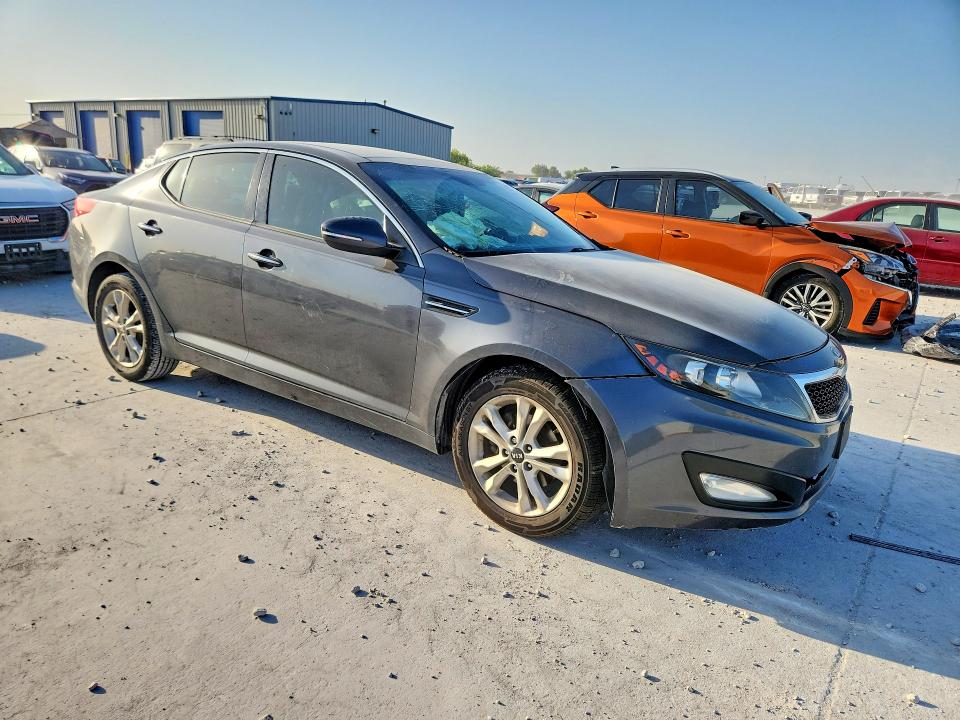 Photo 4 from auction – 2011 KIA OPTIMA with VIN KNAGN4A76B5095895
