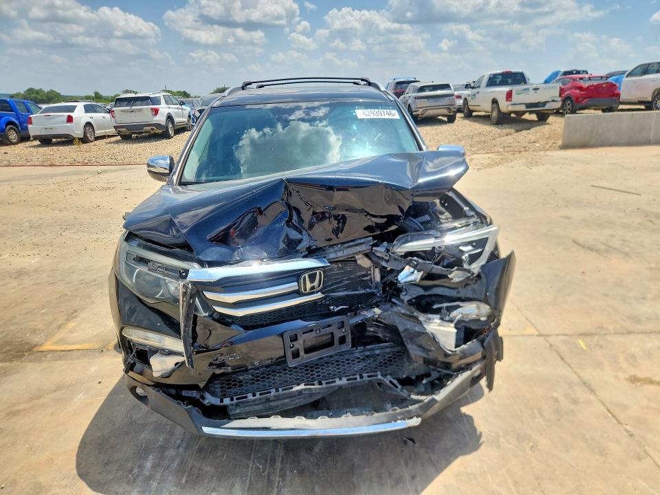 Photo 5 from auction – 2017 HONDA PILOT with VIN 5FNYF6H01HB047642