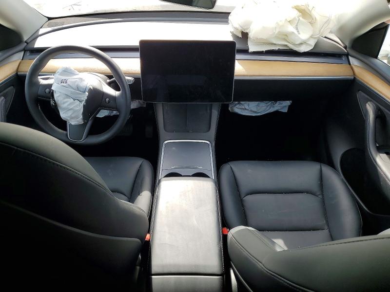 Photo 8 from auction – 2022 TESLA MODEL Y with VIN 7SAYGDEE8NA011394