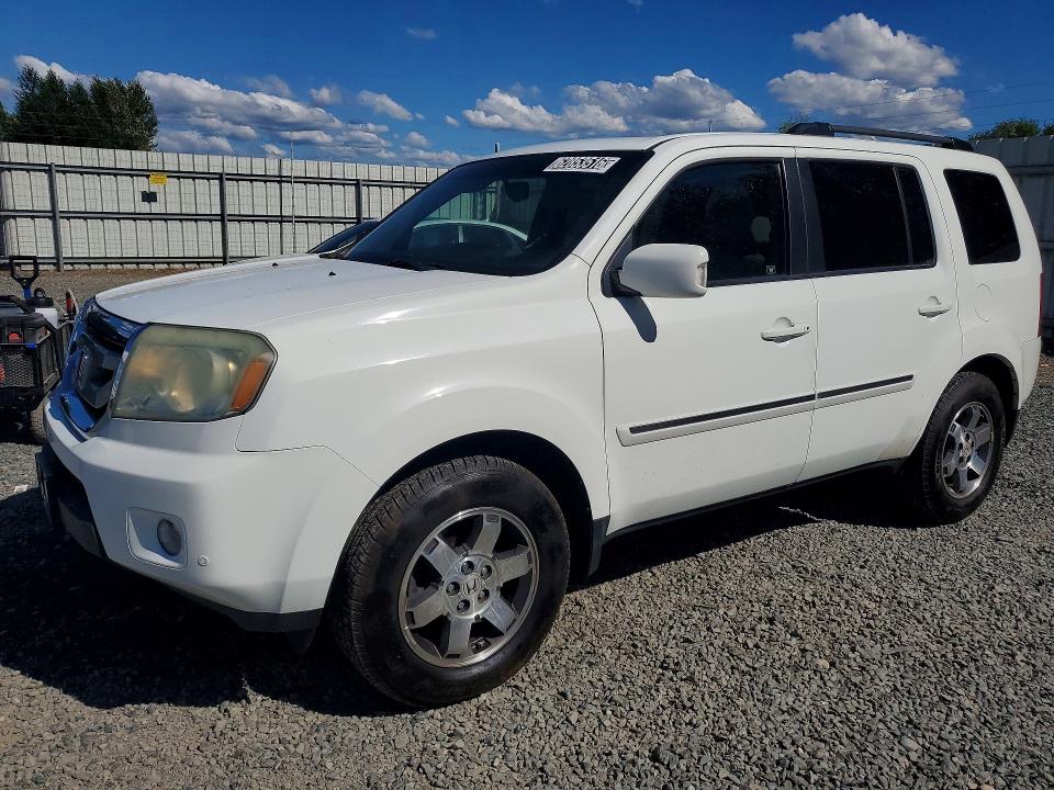 HONDA PILOT 2010 with VIN 5FNYF4H97AB035598 - Photo from auction