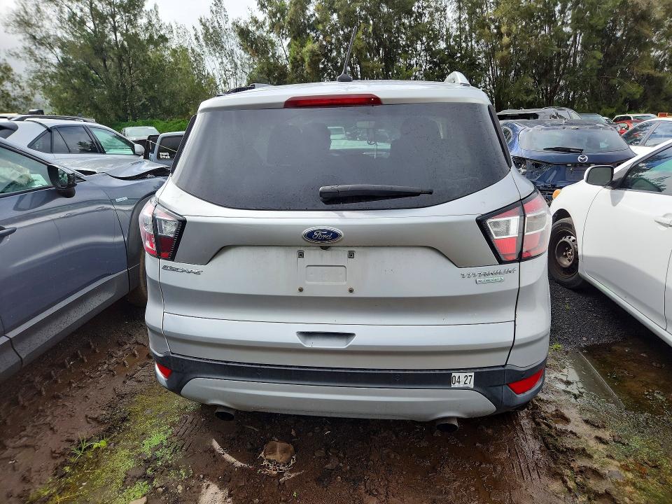 Foto 6 de la subasta – 2018 FORD ESCAPE con VIN 1FMCU0J92JUA42707