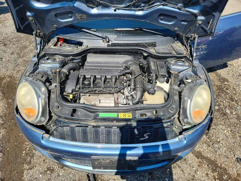 Photo 11 from auction – 2010 MINI COOPER with VIN WMWMF7C51ATZ68959