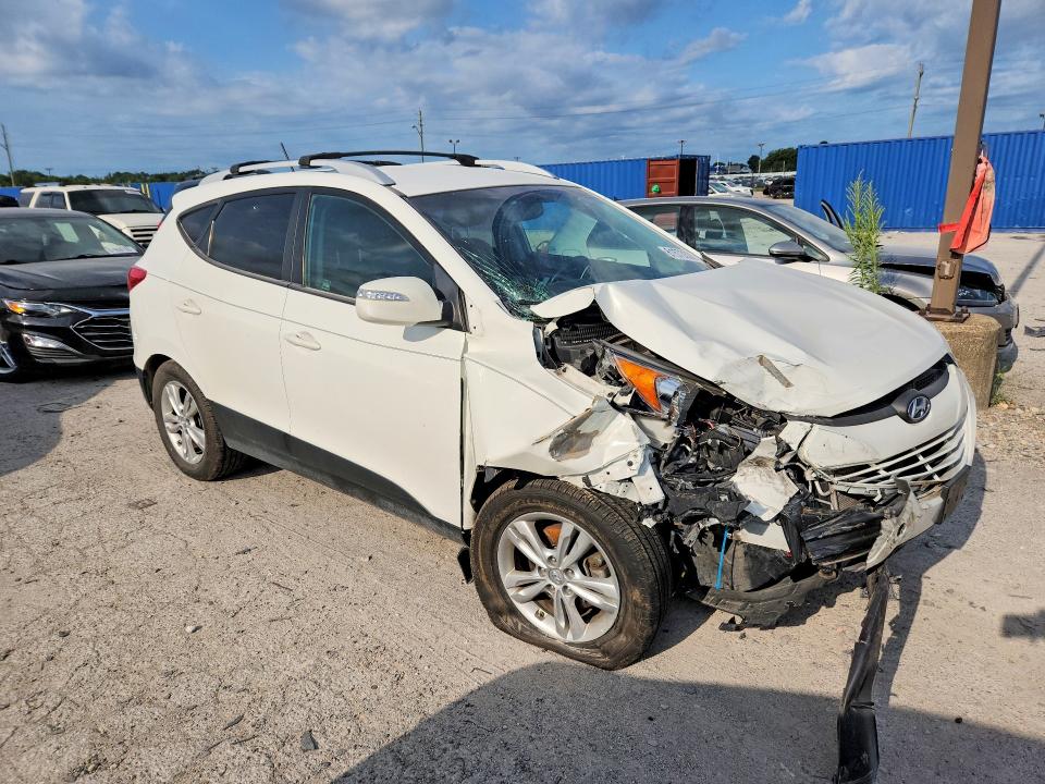 Photo 4 from auction – 2012 HYUNDAI TUCSON with VIN KM8JUCAC4CU396865