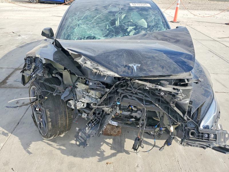 Снимка 11 от търг – 2025 TESLA MODEL 3 с VIN 5YJ3E1ETXSF072738
