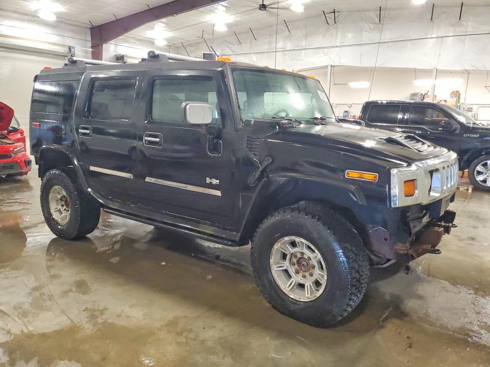 Photo 4 from auction – 2003 HUMMER H2 with VIN 5GRGN23U83H113399