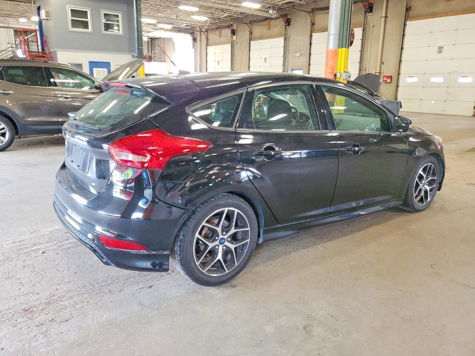 Photo 3 from auction – 2016 FORD FOCUS with VIN 1FADP3K21GL294004