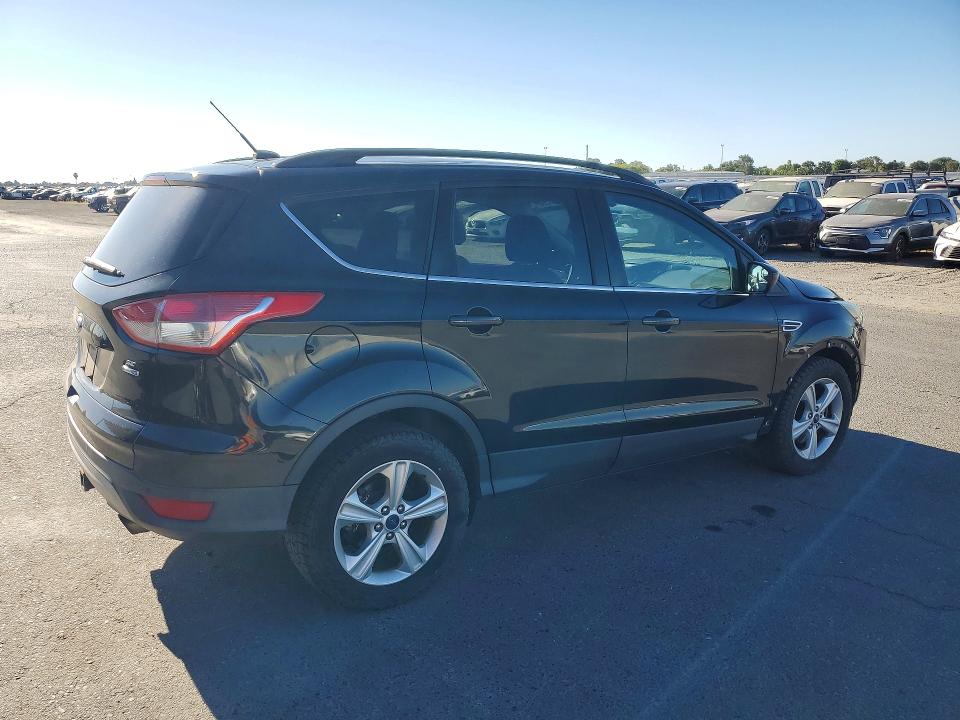 Photo 3 from auction – 2014 FORD ESCAPE with VIN 1FMCU9G98EUE41056