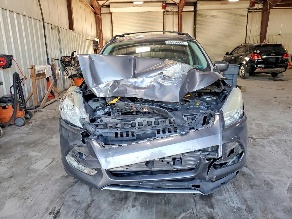 Photo 5 from auction – 2014 FORD ESCAPE with VIN 1FMCU9GX2EUE51161