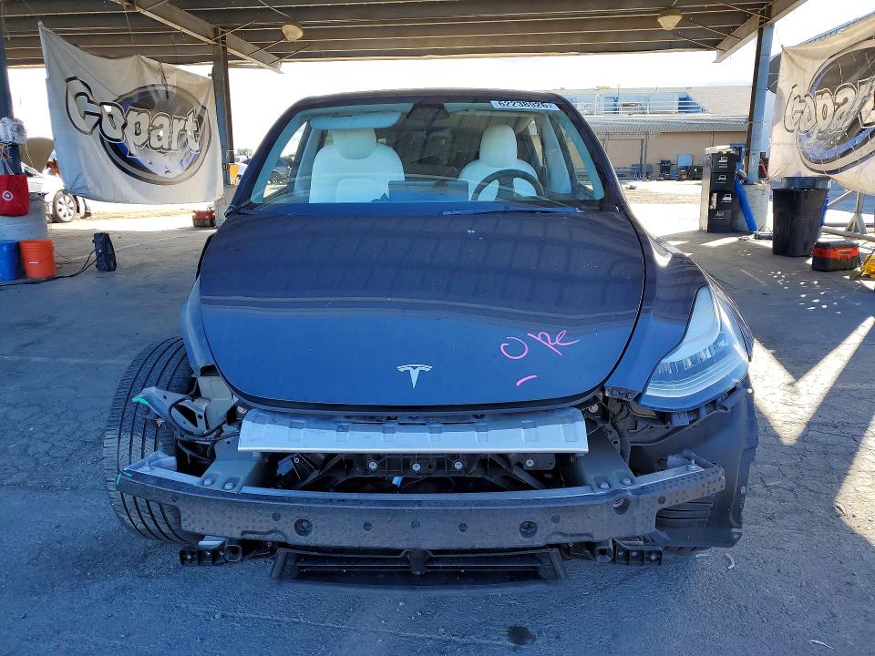 Photo 5 from auction – 2022 TESLA MODEL Y with VIN 7SAYGAEEXNF429246