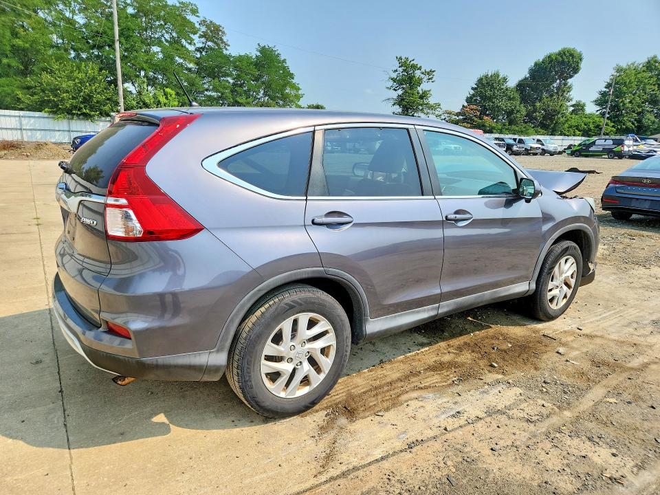 Photo 3 from auction – 2015 HONDA CR-V with VIN 2HKRM4H54FH706001