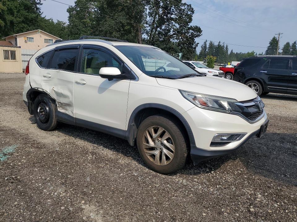 Photo 4 from auction – 2016 HONDA CR-V with VIN 5J6RM4H78GL064763