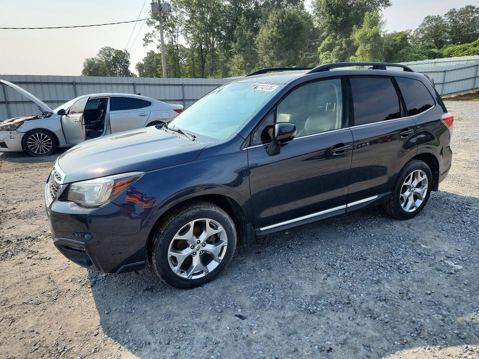 SUBARU FORESTER 2017 with VIN JF2SJATC0HH531523 - Photo from auction