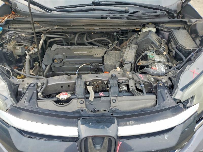 Photo 11 from auction – 2016 HONDA CR-V with VIN 5J6RM4H32GL121794