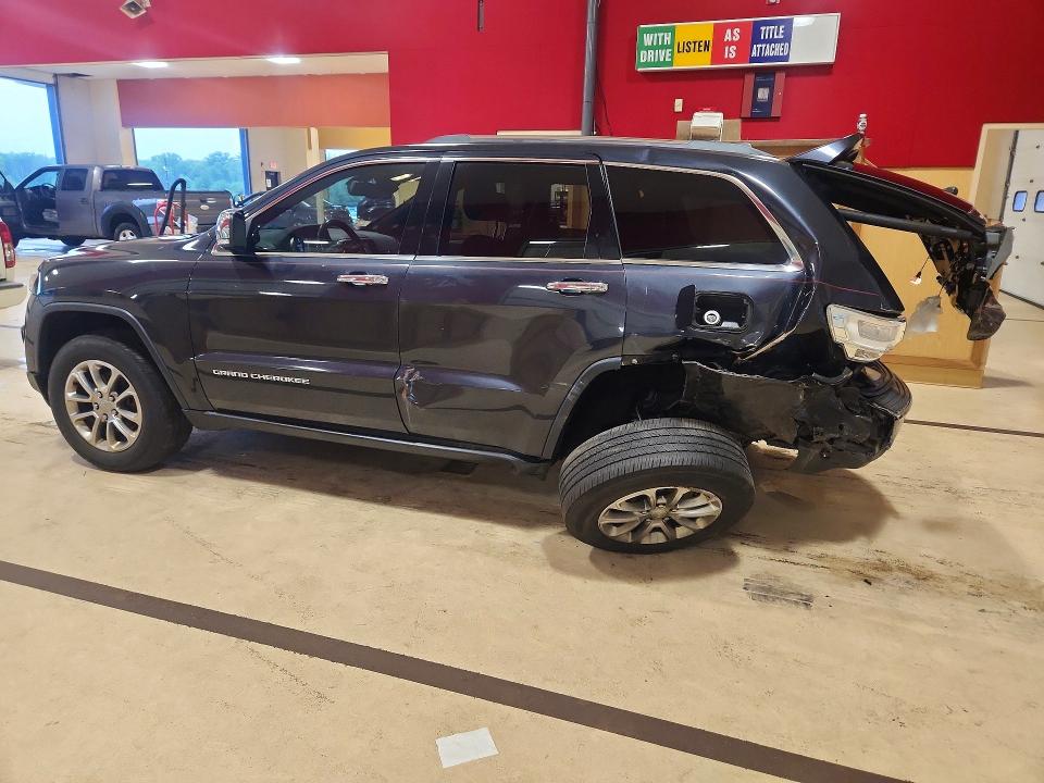 Photo 2 from auction – 2015 JEEP GRAND CHEROKEE with VIN 1C4RJFBG4FC898949