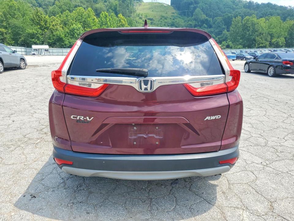 Photo 6 from auction – 2018 HONDA CR-V with VIN 7FARW2H80JE017965