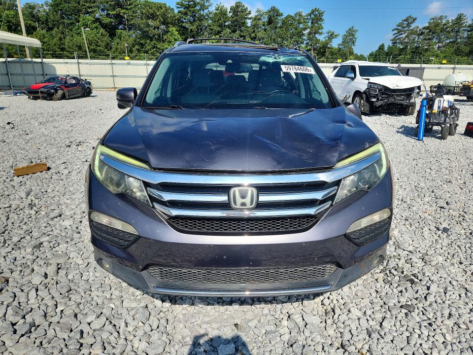 Photo 5 from auction – 2017 HONDA PILOT with VIN 5FNYF5H92HB011662