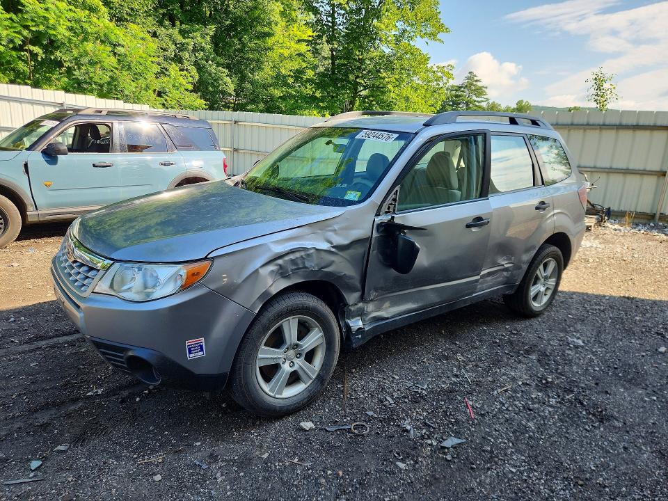 SUBARU FORESTER 2011 with VIN JF2SHABCXBH763924 - Photo from auction