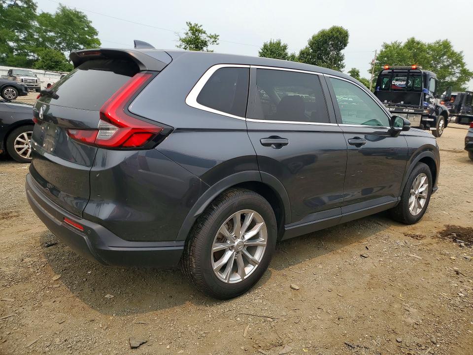 Photo 3 from auction – 2023 HONDA CR-V with VIN 2HKRS4H71PH411351