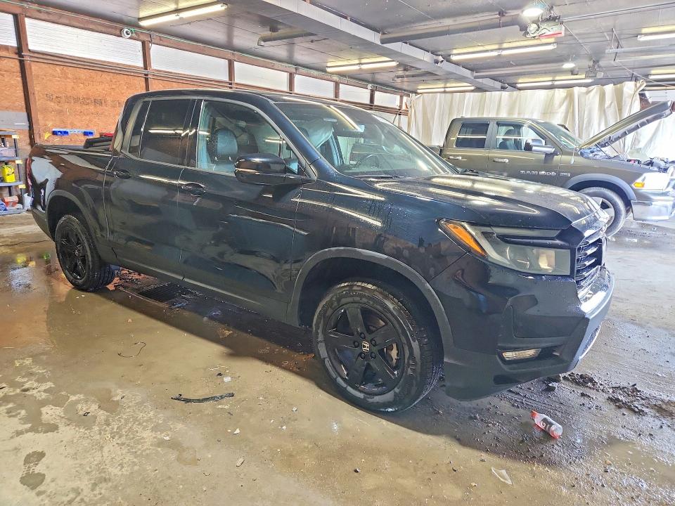 Photo 4 from auction – 2022 HONDA RIDGELINE with VIN 5FPYK3F82NB016325