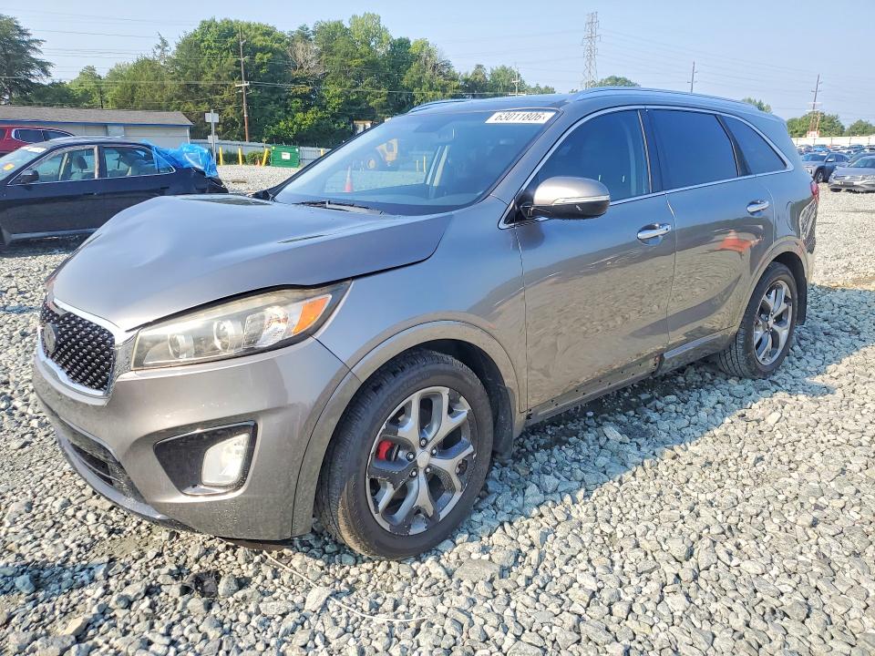 KIA SORENTO 2016 with VIN 5XYPK4A5XGG084035 - Photo from auction