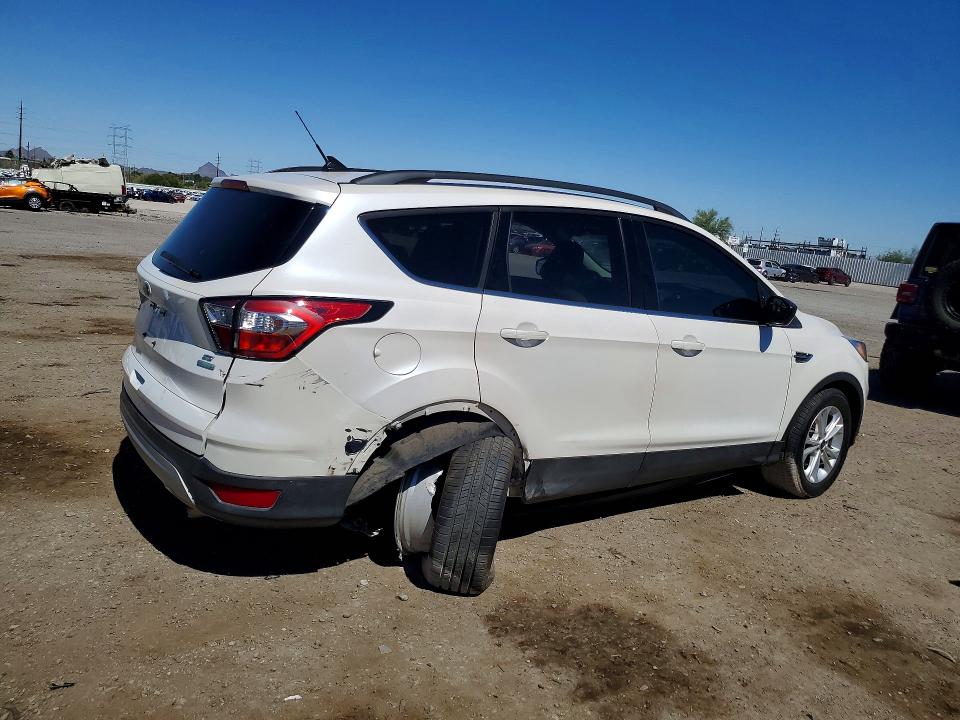 Photo 3 from auction – 2018 FORD ESCAPE with VIN 1FMCU0GD2JUC19140