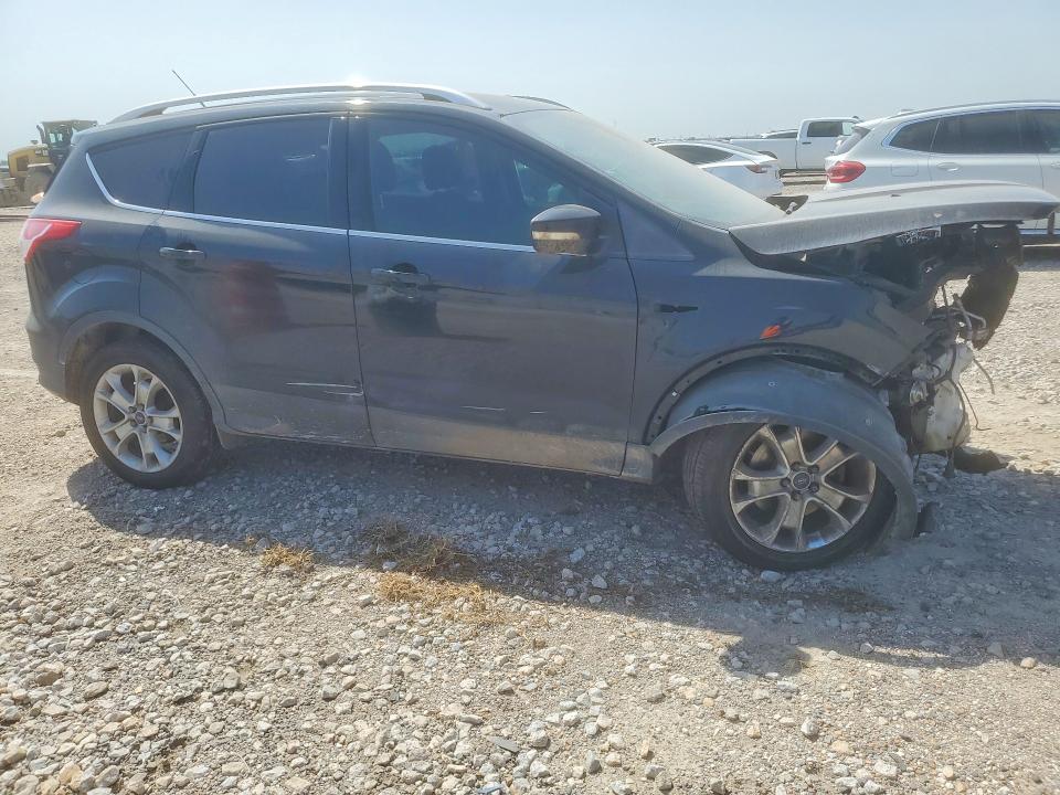 Photo 4 from auction – 2016 FORD ESCAPE with VIN 1FMCU0J99GUA75356