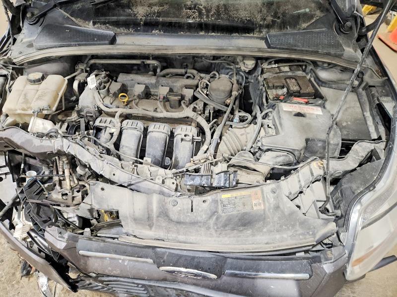 Photo 11 from auction – 2014 FORD FOCUS with VIN 1FADP3F26EL238390