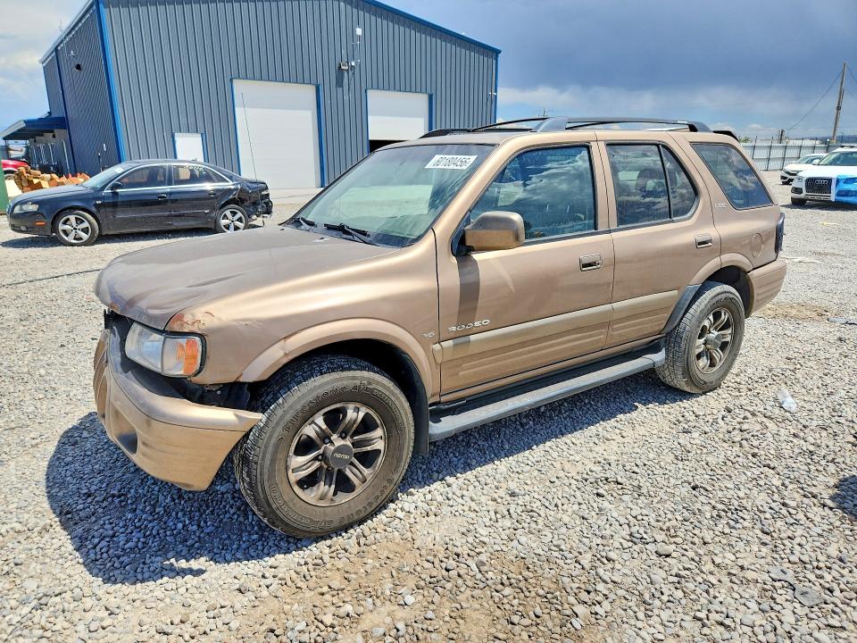ISUZU RODEO 2000 with VIN 4S2DM58W8Y4326455 - Photo from auction