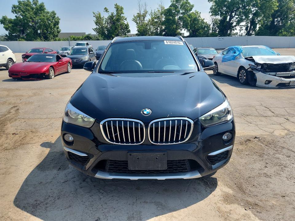 Photo 5 from auction – 2016 BMW X1 with VIN WBXHT3C37G5E50328