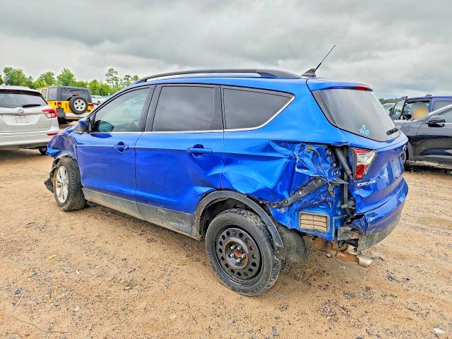 Photo 2 from auction – 2018 FORD ESCAPE with VIN 1FMCU0HD1JUD02833