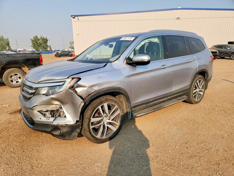 HONDA PILOT 2018 with VIN 5FNYF6H90JB502341 - Photo from auction