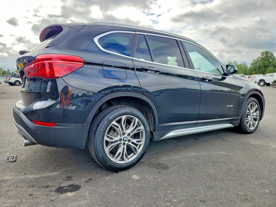 Photo 3 from auction – 2016 BMW X1 with VIN WBXHT3Z35G4A48403
